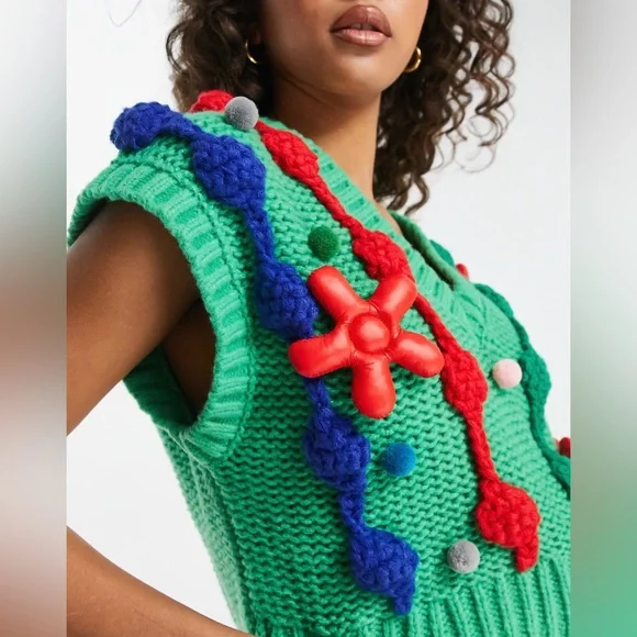 Urban Revivo knitted vest with swirl and pom poms detailing in green! Never worn - Picture 2 of 3